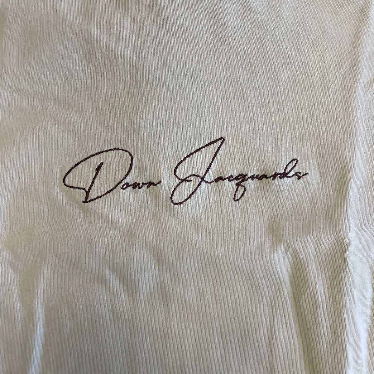 Camiseta Down Cursivat Bege
