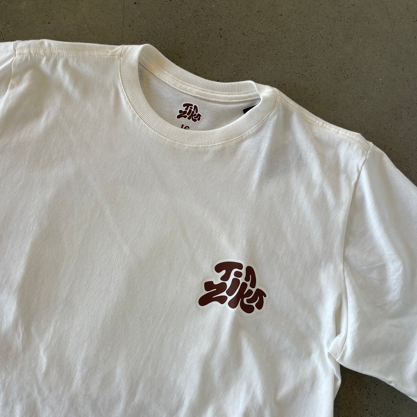 CAMISETA OFF-WHITE/MARROM Tia Zika